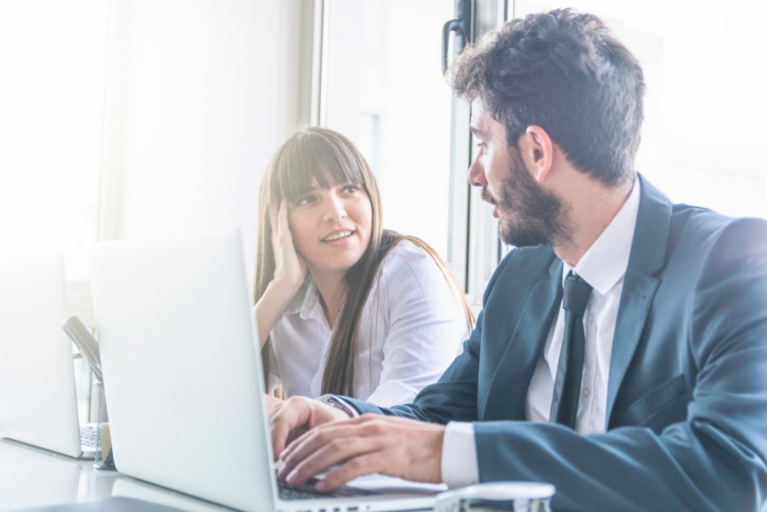 Student reviewing financial progress and planning documents